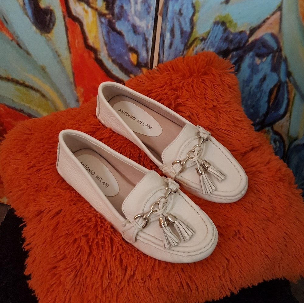 White leather loafers